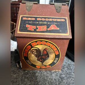 This is a Red Rooster Brand tea box, which is used for decorative storage